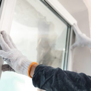 Worker,Installing,Plastic,Window,Indoors,,Closeup,View